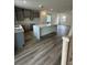 Kitchen with a large island that flows into an open living area at 1521 Bat Hawk St, Las Vegas, NV 89138