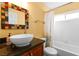 Bathroom with vessel sink, tiled shower, and mosaic mirror at 1715 Mesquite Ct, Henderson, NV 89014