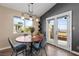 Bright dining room with large windows and patio access at 1715 Mesquite Ct, Henderson, NV 89014