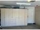 Garage with built-in storage cabinets and flooring at 1715 Mesquite Ct, Henderson, NV 89014