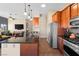 Modern kitchen with stainless steel appliances and granite countertops at 1715 Mesquite Ct, Henderson, NV 89014