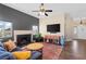 Living room with fireplace, flat-screen TV and comfortable seating at 1715 Mesquite Ct, Henderson, NV 89014