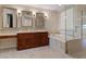 Elegant bathroom with double vanity, soaking tub and shower at 20 Via Mantova # 309, Henderson, NV 89011