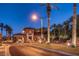 Gated entrance to a luxury community at night at 20 Via Mantova # 309, Henderson, NV 89011