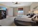 Spacious main bedroom with large round bed and walk-in closet at 20 Via Mantova # 309, Henderson, NV 89011