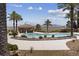 Relaxing pool area with palm trees and mountain views at 20 Via Mantova # 309, Henderson, NV 89011