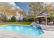 Inviting backyard oasis featuring a sparkling pool, spa, and gazebo at 2000 Catalina Marie Ave, Henderson, NV 89074