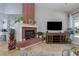 Brick fireplace is a focal point in this Gathering room at 2000 Catalina Marie Ave, Henderson, NV 89074