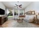 Relaxing Gathering room with sectional sofa, fireplace, and large windows at 2000 Catalina Marie Ave, Henderson, NV 89074