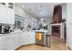 Spacious kitchen with island, stainless steel appliances, and white cabinets at 2000 Catalina Marie Ave, Henderson, NV 89074