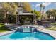 Stunning pool area with gazebo, spa, and lush landscaping at 2000 Catalina Marie Ave, Henderson, NV 89074