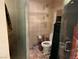 Small bathroom with toilet and shower at 2000 N Fashion Show Dr # 1704, Las Vegas, NV 89109