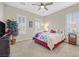 Comfortable bedroom with a king-size bed and plenty of natural light at 2050 Cambridge Springs Dr, Henderson, NV 89052