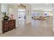 Bright entryway with tile floors and view of living room at 2050 Cambridge Springs Dr, Henderson, NV 89052