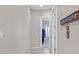 Bright hallway with tile flooring and access to other rooms at 2050 Cambridge Springs Dr, Henderson, NV 89052