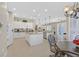 Island kitchen with white cabinets and granite countertops at 2050 Cambridge Springs Dr, Henderson, NV 89052