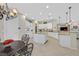 Spacious kitchen featuring granite countertops, white cabinetry, and an island at 2050 Cambridge Springs Dr, Henderson, NV 89052