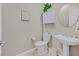 Convenient powder room with pedestal sink and toilet at 2050 Cambridge Springs Dr, Henderson, NV 89052