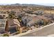 Aerial view of house and neighborhood, showcasing mountain views at 2124 Danzinger Pl, Henderson, NV 89044