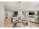 Open concept dining area with kitchen and living room views at 2124 Danzinger Pl, Henderson, NV 89044