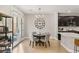 Bright dining area with table and chairs, adjacent to kitchen at 2124 Danzinger Pl, Henderson, NV 89044