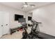 Home gym with Peloton bike, treadmill, and ample floor space at 2124 Danzinger Pl, Henderson, NV 89044