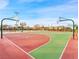 Outdoor basketball court with two hoops and seating at 2130 Maderno St, Henderson, NV 89044