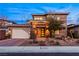 Attractive two-story home with a landscaped front yard at 2130 Maderno St, Henderson, NV 89044