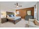 Main bedroom with a dresser and seating area at 2130 Maderno St, Henderson, NV 89044