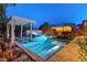 Luxury pool and spa with pergola and outdoor kitchen at 2130 Maderno St, Henderson, NV 89044