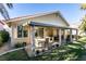 Patio, lawn, and covered seating area at 2132 Timber Rose Dr, Las Vegas, NV 89134