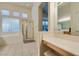 Main bathroom with double sinks, soaking tub, and separate shower at 2132 Timber Rose Dr, Las Vegas, NV 89134