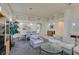 Elegant dining room with a marble table and chandelier at 2132 Timber Rose Dr, Las Vegas, NV 89134