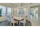 Bright dining area with a formal table and six chairs at 2132 Timber Rose Dr, Las Vegas, NV 89134