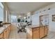 Spacious kitchen with island, granite counters & wood cabinets at 2132 Timber Rose Dr, Las Vegas, NV 89134