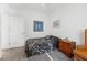 Bedroom with floral bedding, wood nightstand, and carpeted floors at 2255 Potter Lake Ave, Henderson, NV 89052