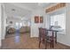 Bright dining area with table and chairs, open to living room at 2255 Potter Lake Ave, Henderson, NV 89052