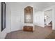 Bright entryway featuring tile floors, artwork, and a white front door at 2255 Potter Lake Ave, Henderson, NV 89052