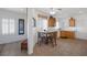 Kitchen with light wood cabinets, breakfast nook and tile floors at 2255 Potter Lake Ave, Henderson, NV 89052