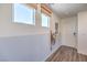 Bright entryway with wood-look floors and a two-toned wall at 2641 Snapdragon Falls Ave # 106, North Las Vegas, NV 89081