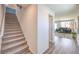 Carpeted staircase leading to the upper level of the home at 2641 Snapdragon Falls Ave # 106, North Las Vegas, NV 89081