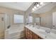 Bathroom boasts double sinks, soaking tub, and walk-in shower at 2694 Kinghorn Pl, Henderson, NV 89044