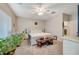 Main bedroom with king bed, and en-suite bathroom access at 2694 Kinghorn Pl, Henderson, NV 89044