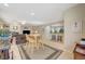 Open dining area with kitchen and living room views at 2694 Kinghorn Pl, Henderson, NV 89044