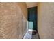 Entryway with dark green door and patterned rug at 2694 Kinghorn Pl, Henderson, NV 89044