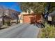 Single-story home with a two-car garage and drought-tolerant landscaping at 2694 Kinghorn Pl, Henderson, NV 89044