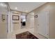 Bright foyer with tile floors and access to living room at 2694 Kinghorn Pl, Henderson, NV 89044