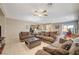 Relaxing living room with comfy sofas and a ceiling fan at 2694 Kinghorn Pl, Henderson, NV 89044