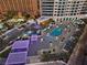 Aerial view of resort-style pool area with multiple pools, loungers, and palm trees at 2700 Las Vegas Blvd # 809, Las Vegas, NV 89109