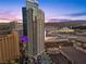 Modern high-rise building with city views at dusk at 2700 Las Vegas Blvd # 809, Las Vegas, NV 89109